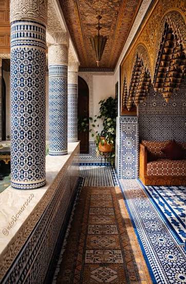 A carved cedar ceiling in Morocco — the intricate geometric and floral patterns are cut by hand into Atlas cedar, a tradition brought directly from Al-Andalus and still practised by master craftsmen in Fes today